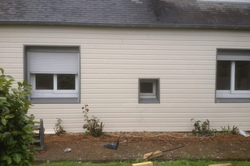 Pose d'un bardage composite extérieur sur façade