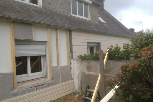 Pose d'un bardage composite extérieur sur façade