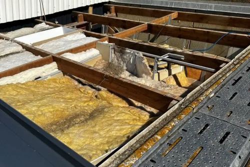 Remplacement de l'isolation + pose de la toiture complète et du bardage